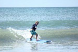 child surfing